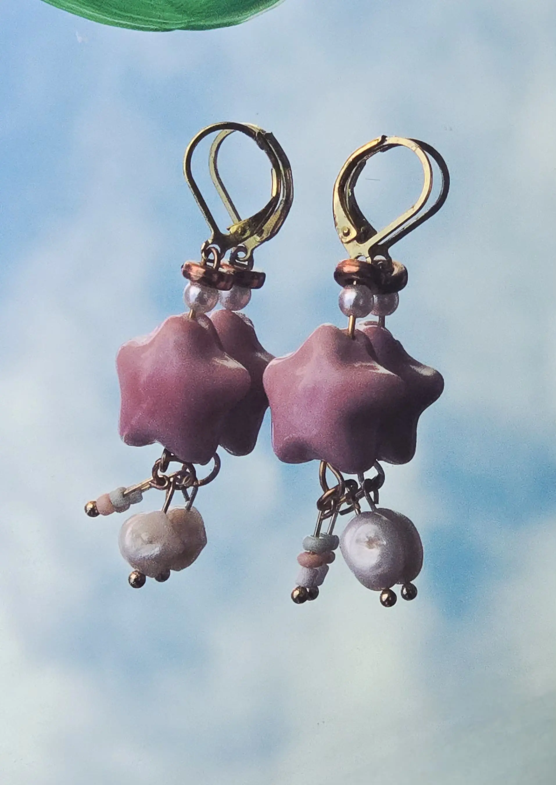 Pink star earrings with hanging beads