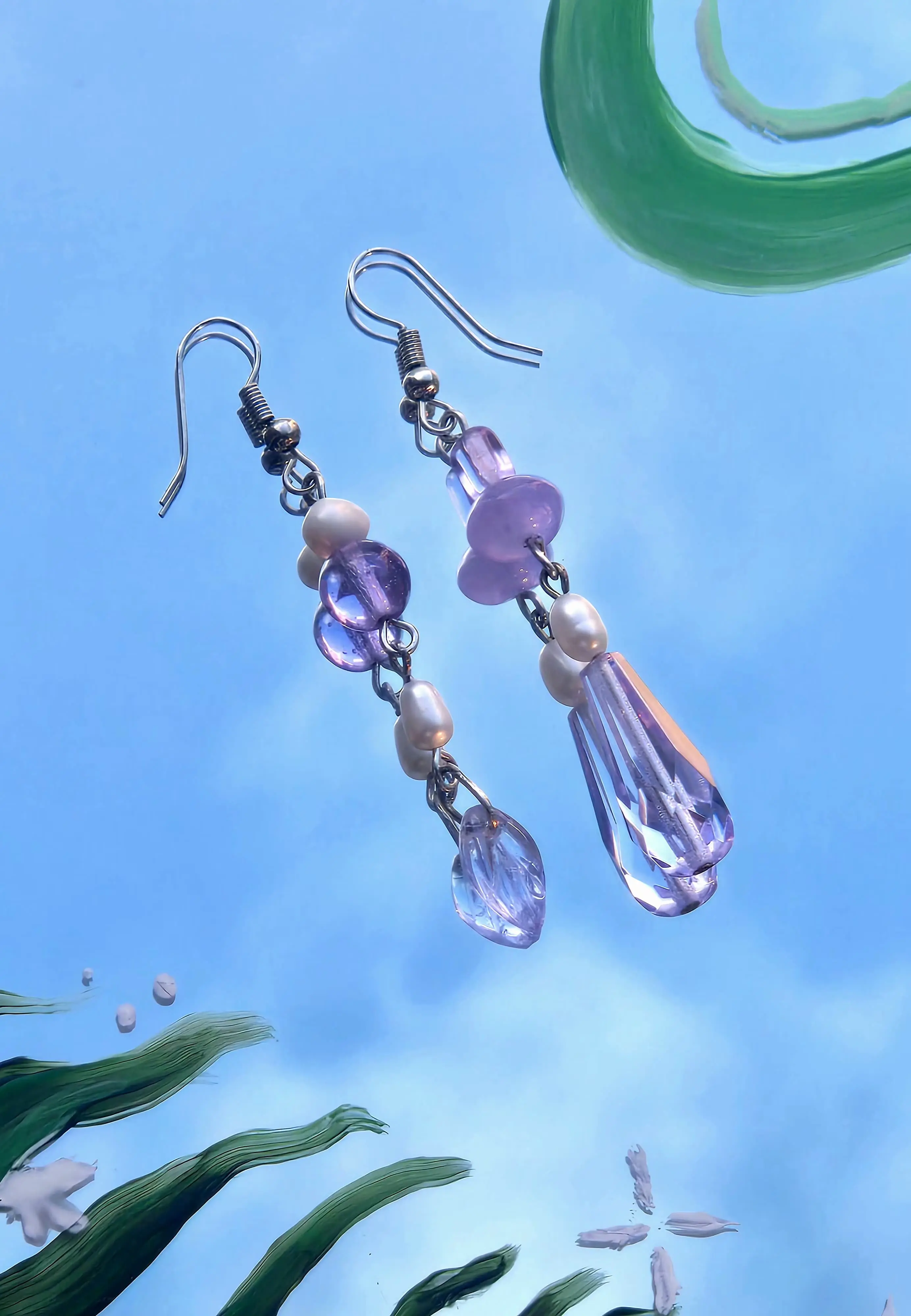 Silver earrings with purple beads